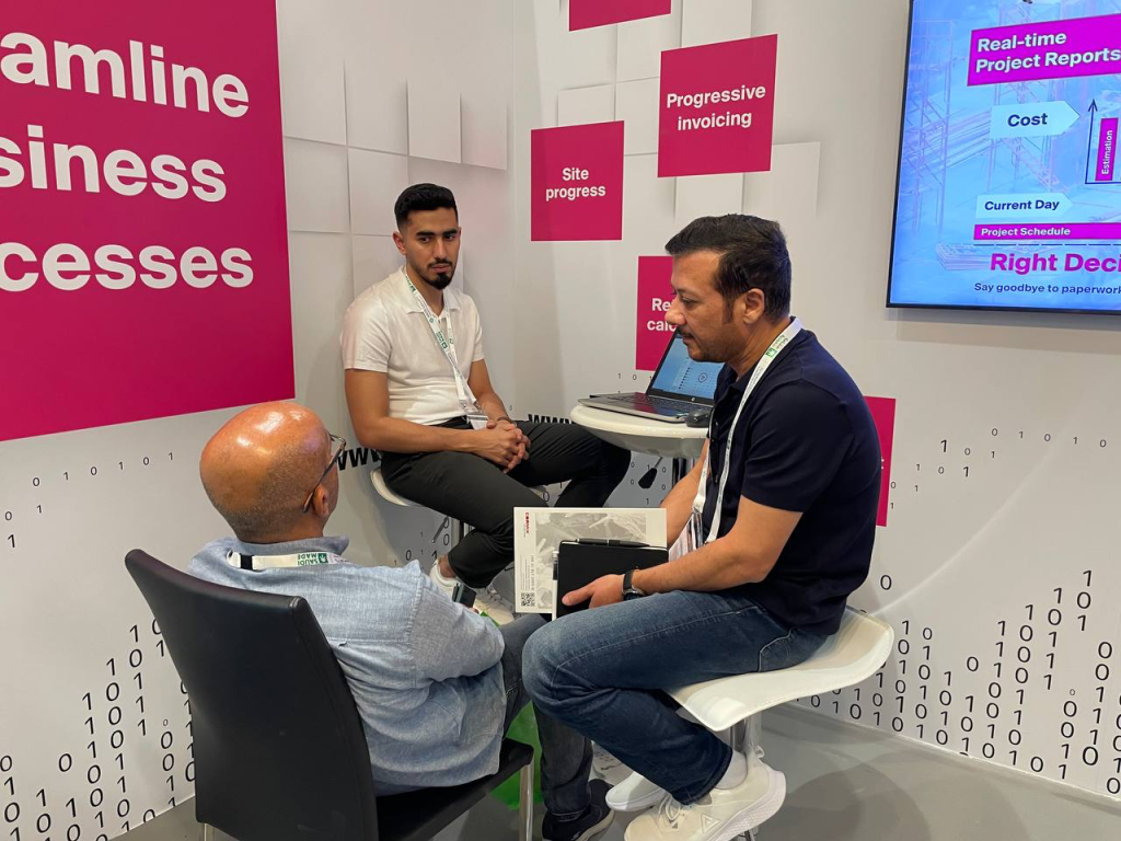 First Bit team talking to prospective clients
