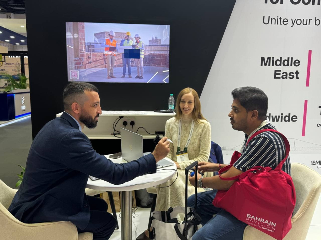 Giving our business cards to visitors